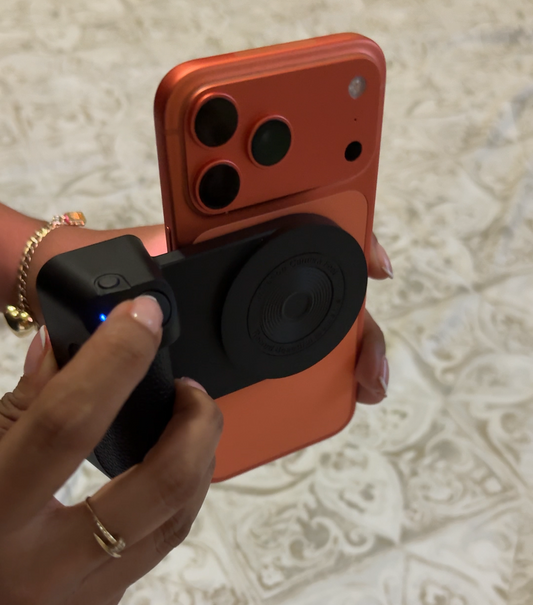 Mango magnético tipo cámara para celular